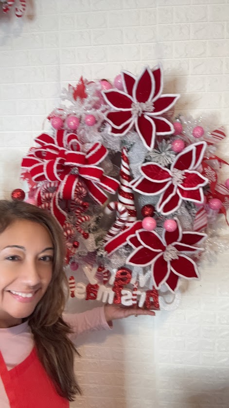 Christmas Wreath with Red Poinsettias and Candy Cane Accents